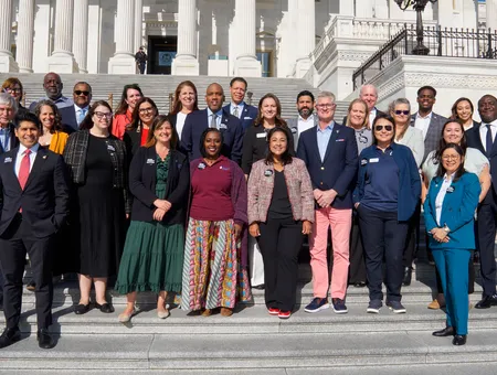 CIS leaders standing on the steps in front of the capitol