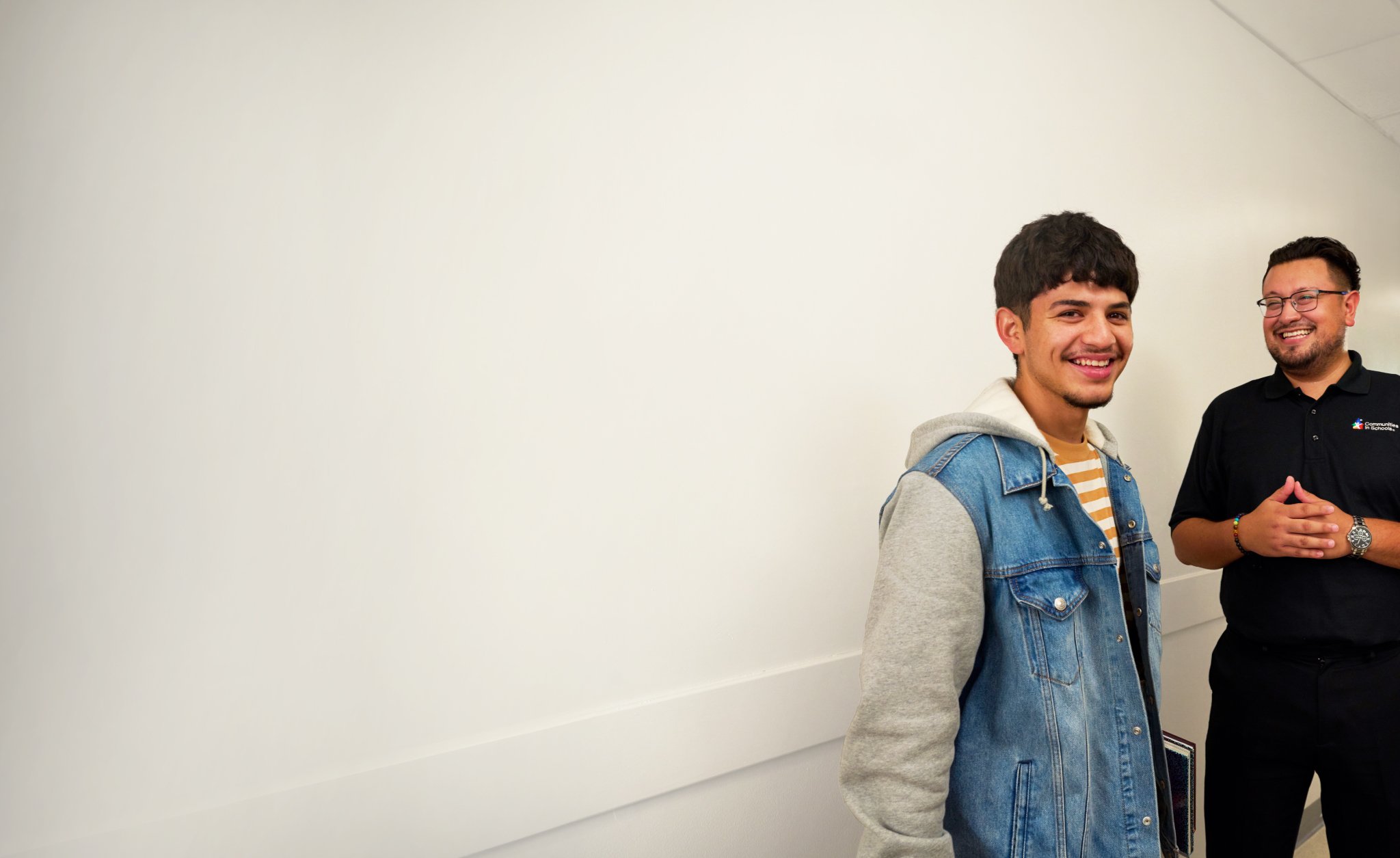 Student with globe and stack of books