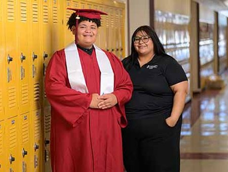 CIS Graduate Tony and Site Coordinator Miss Ruby