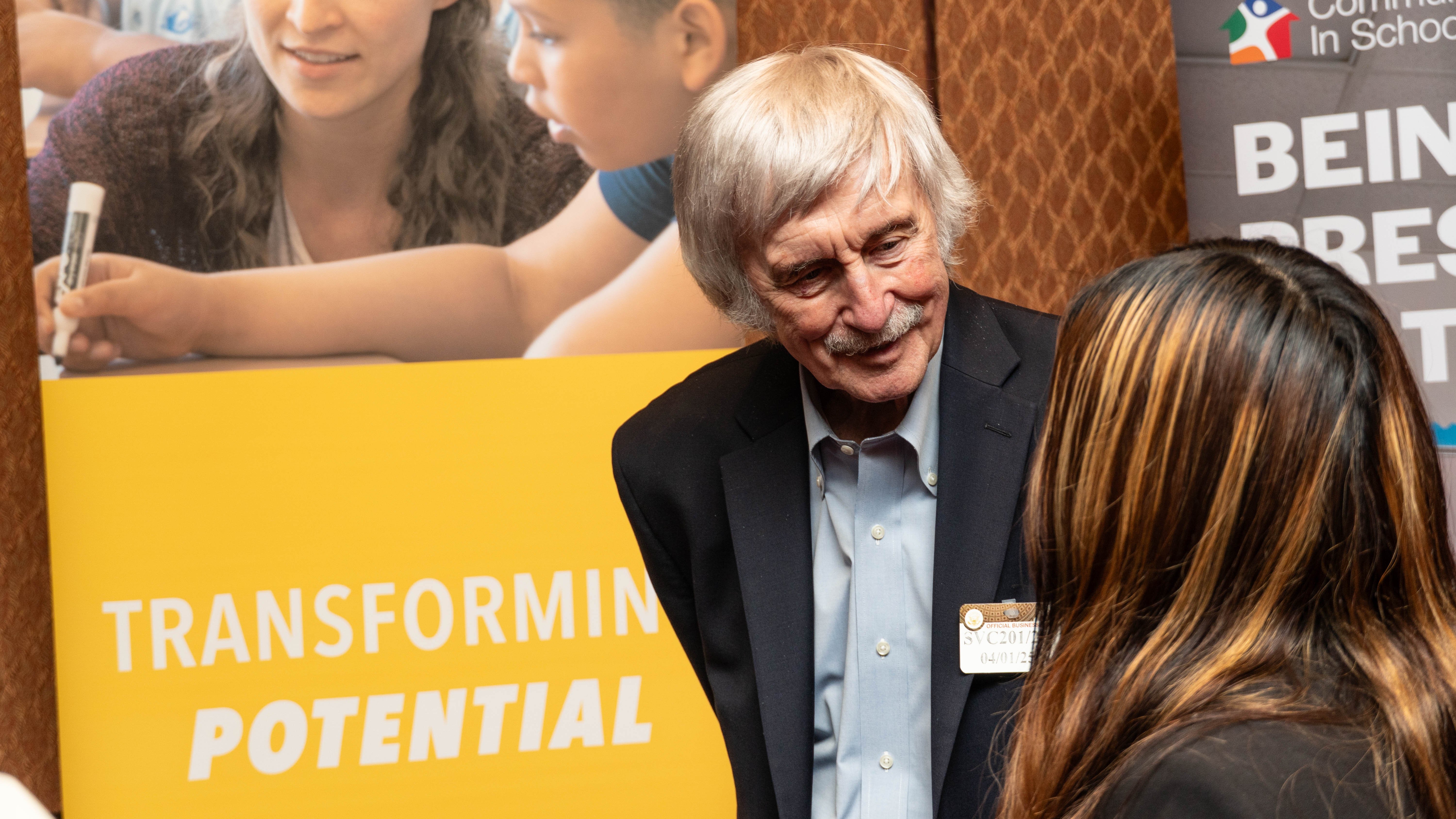 CIS Founder Bill Milliken speaking to student